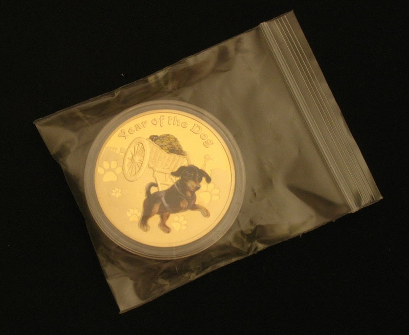 A Pair of 2018 Year of the Dog Lunar Zodiac Dog Pull a Treasure Car Coins